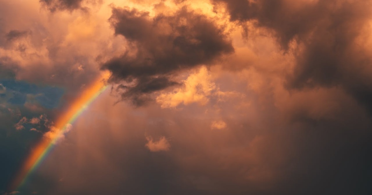 Dark clouds with a rainbow