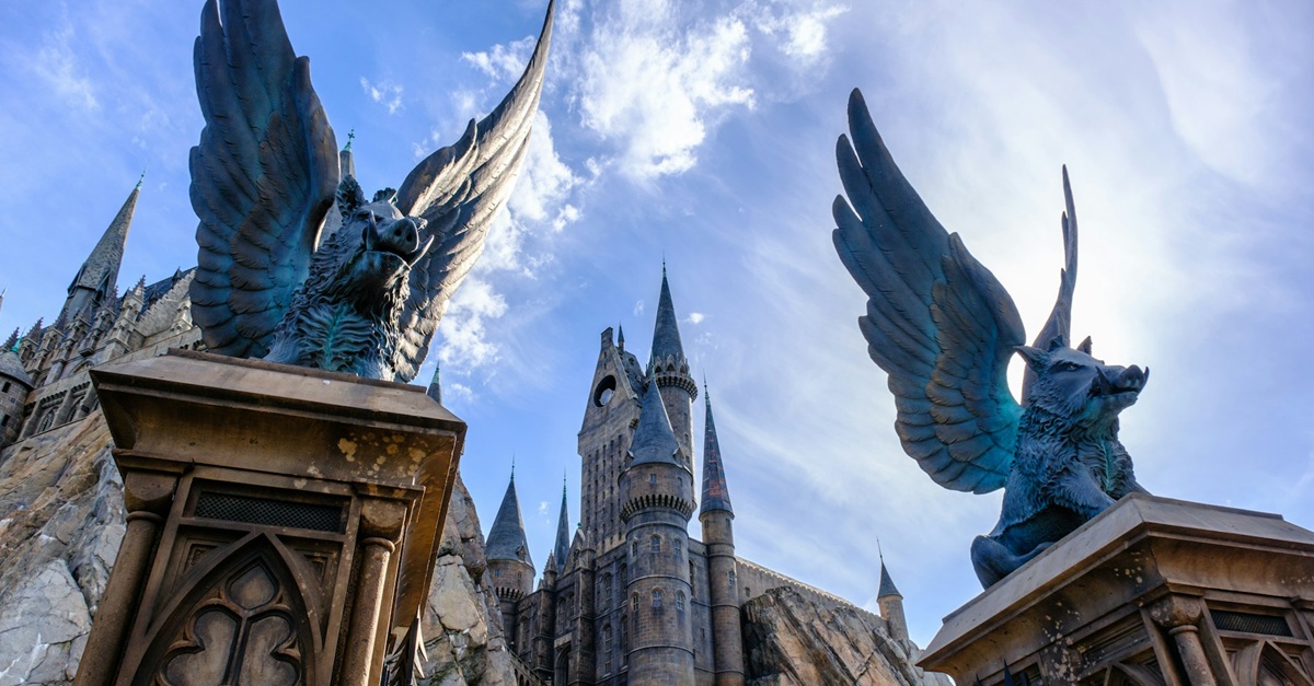 Winged hog pillar tops at entrance to Hogsmeade