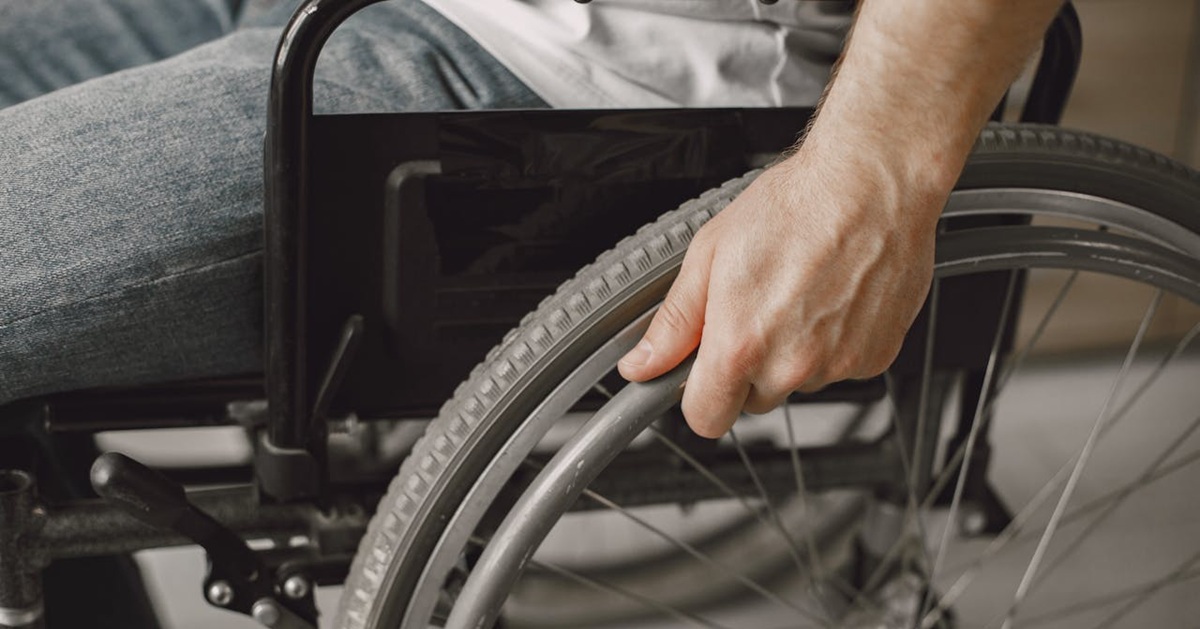 Close-up of man in wheelchair