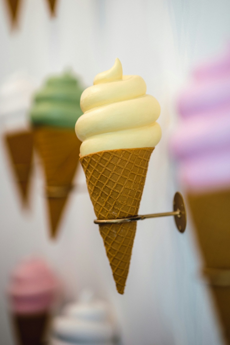 Yellow ice cream in a cone