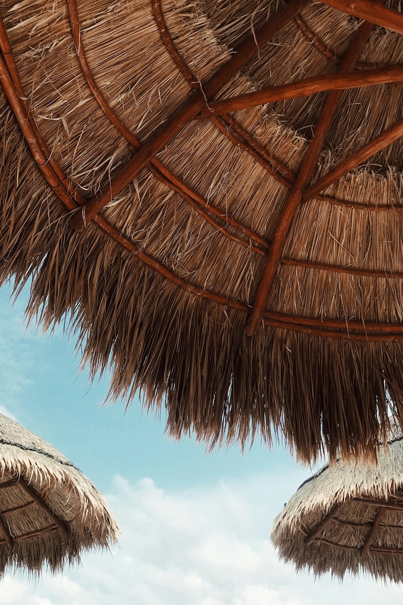 View looking up at beach parasols